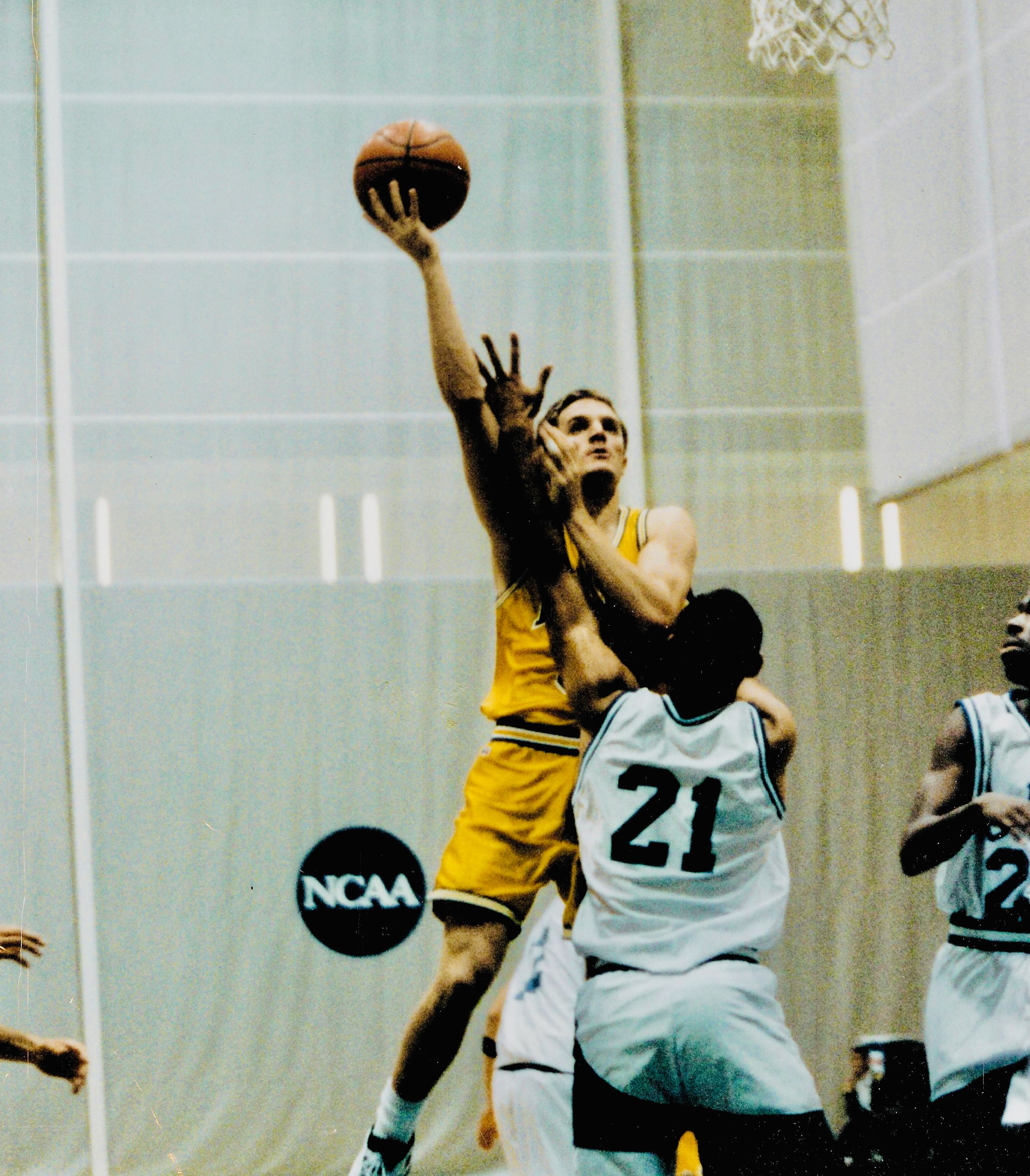 Nate Heckman going up for a shot at an NCAA tournament game